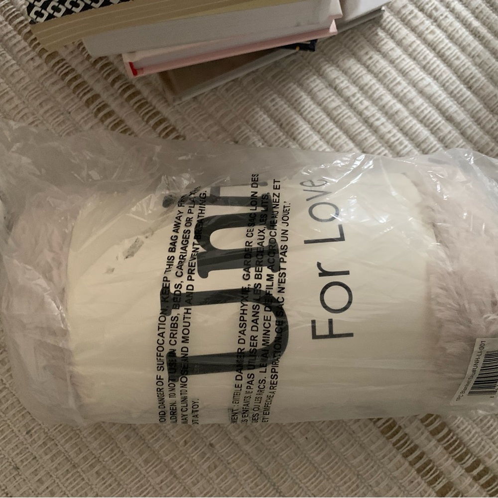 UnHide Cream Throw Blanket